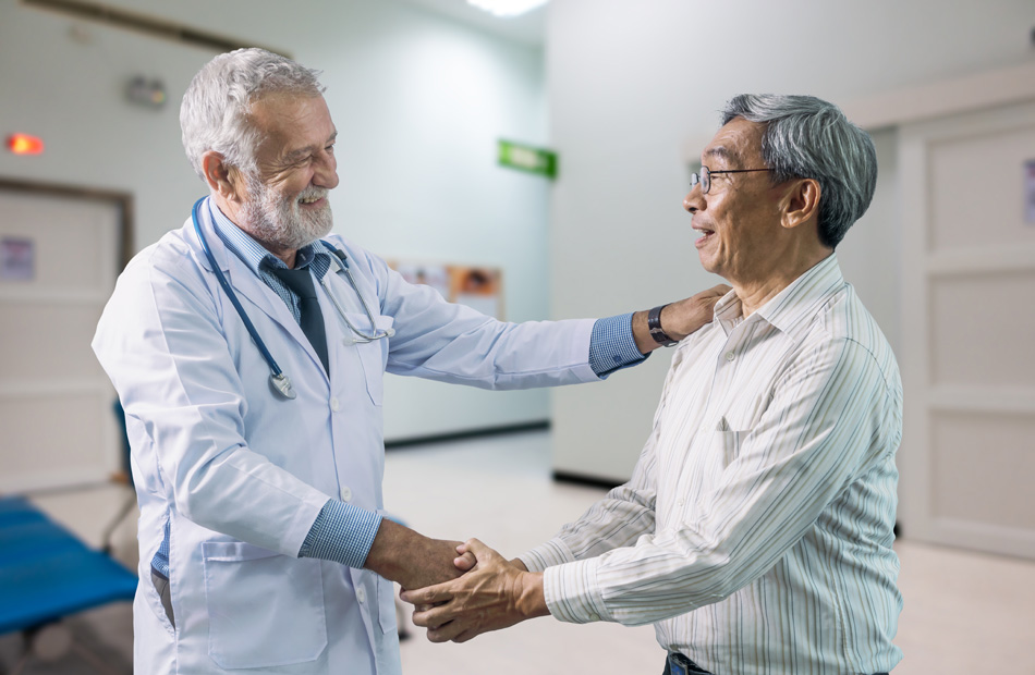 Physician greeting patient with handshake