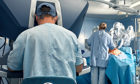 Medical team performing robotic-assisted surgery