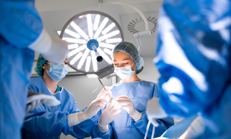 Surgical team performing operation in OR